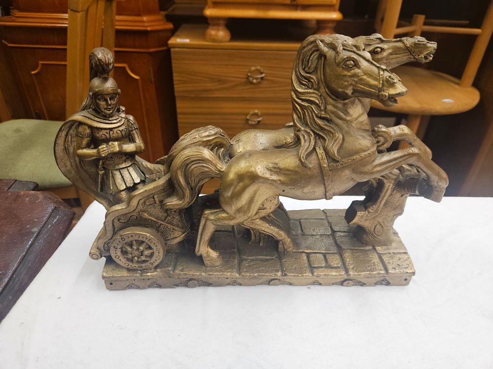Lot 317 – A Bronzed Resin Model of a Roman Charioteer and Horses