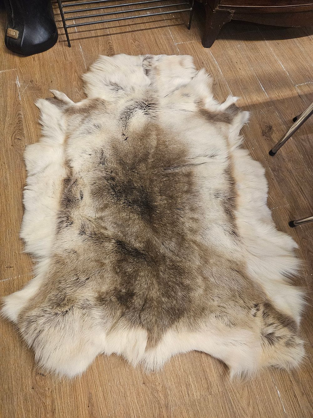 Lot 332 – A Natural Reindeer Hide Pelt Rug
