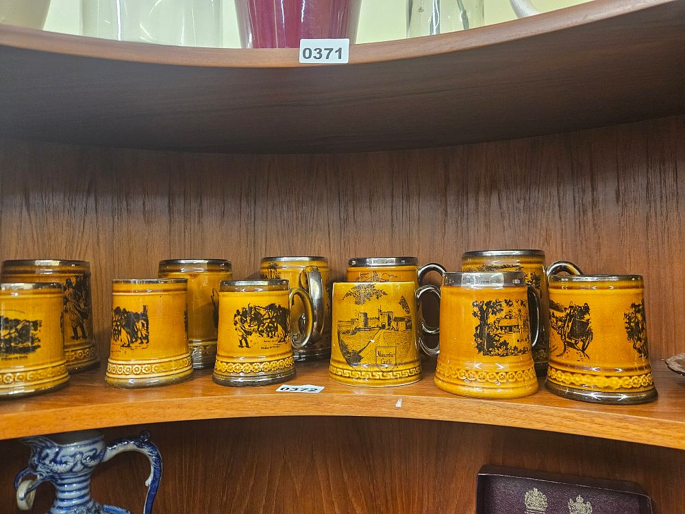Lot 372 – A Collection of Lord Nelson Style Glazed Earthenware Tankards and Miniature Jugs