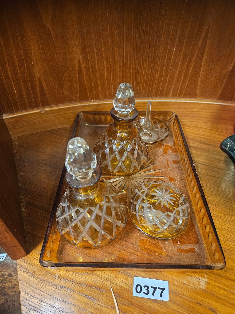 Lot 377 – A Four-Piece Amber Cut Glass Dressing Table Set