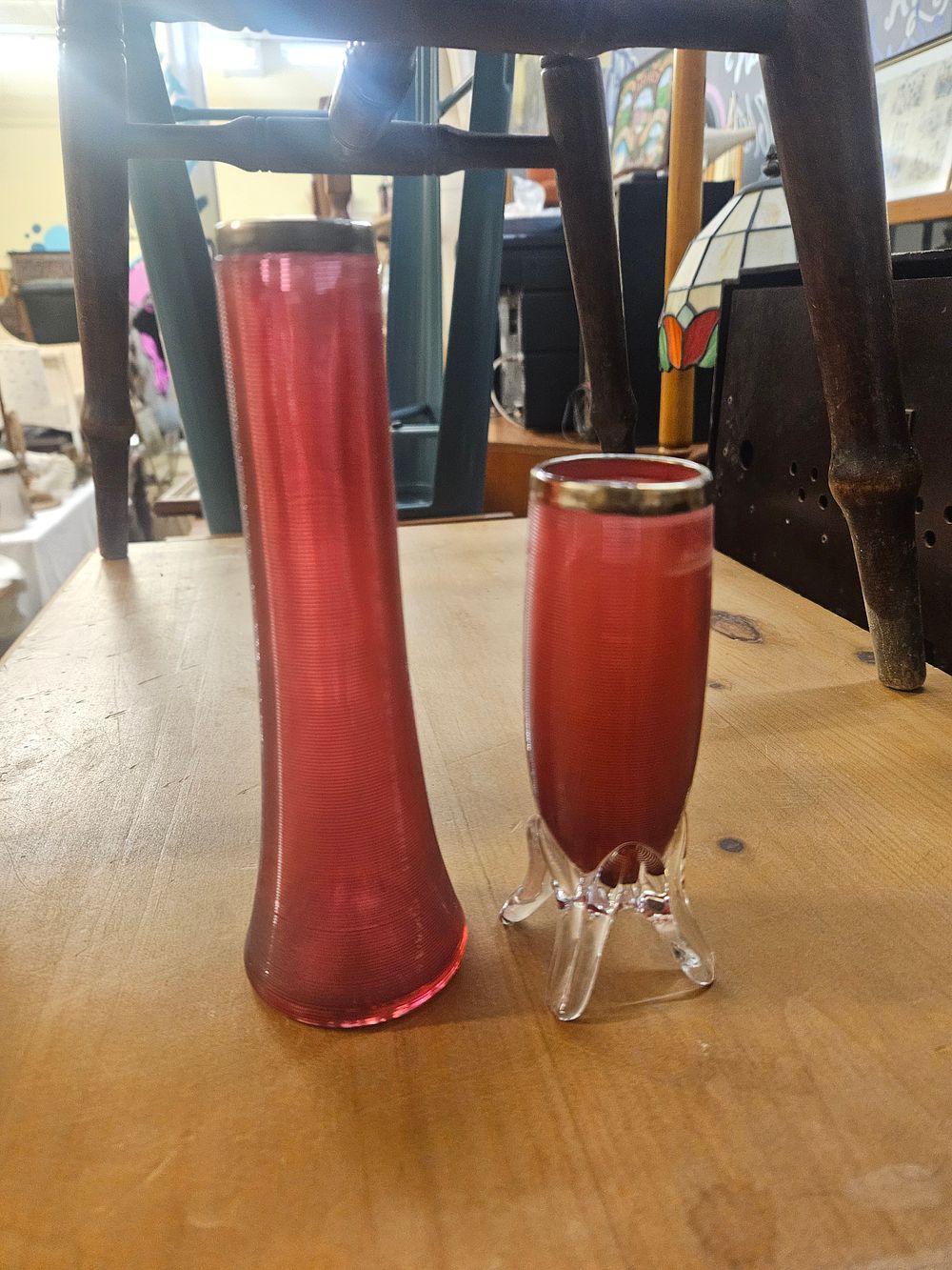 Lot 398 – A Pair of Edwardian Ruby Red Threaded Glass Vases one with a Birmingham Sterling Silver Mount
