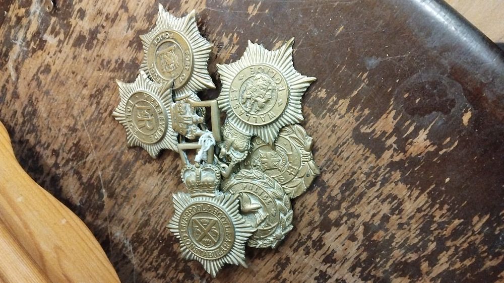 Lot 401 – A Collection of Merseyside Area Police Helmet Plates and Cap Badges