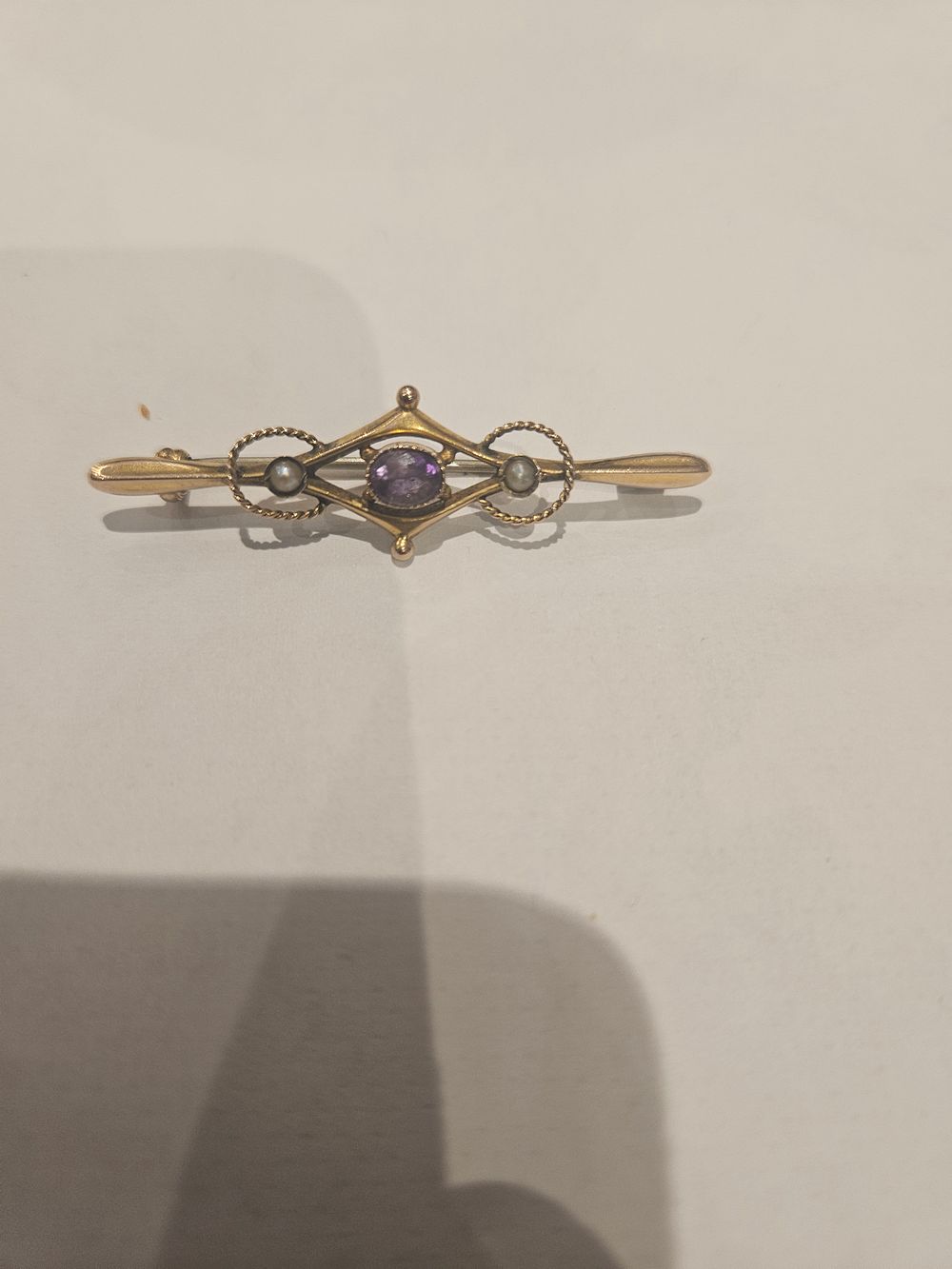 Lot 429 – Edwardian 9 Carat Gold Amethyst and Seed Pearl Bar Brooch 1.6grams