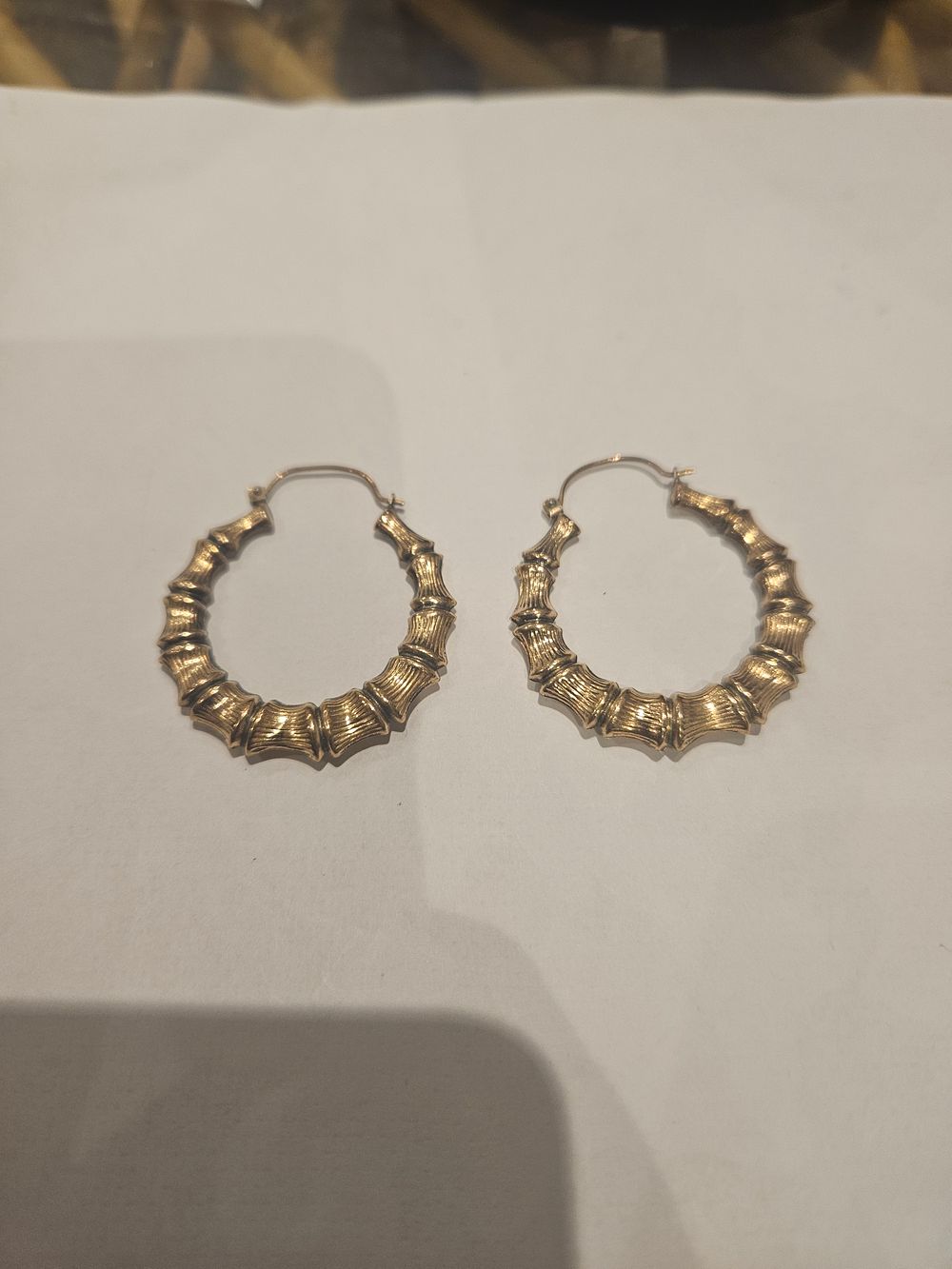 Lot 437 – A Pair of 9ct gold Bamboo Style Hoop Earrings 3.1grams