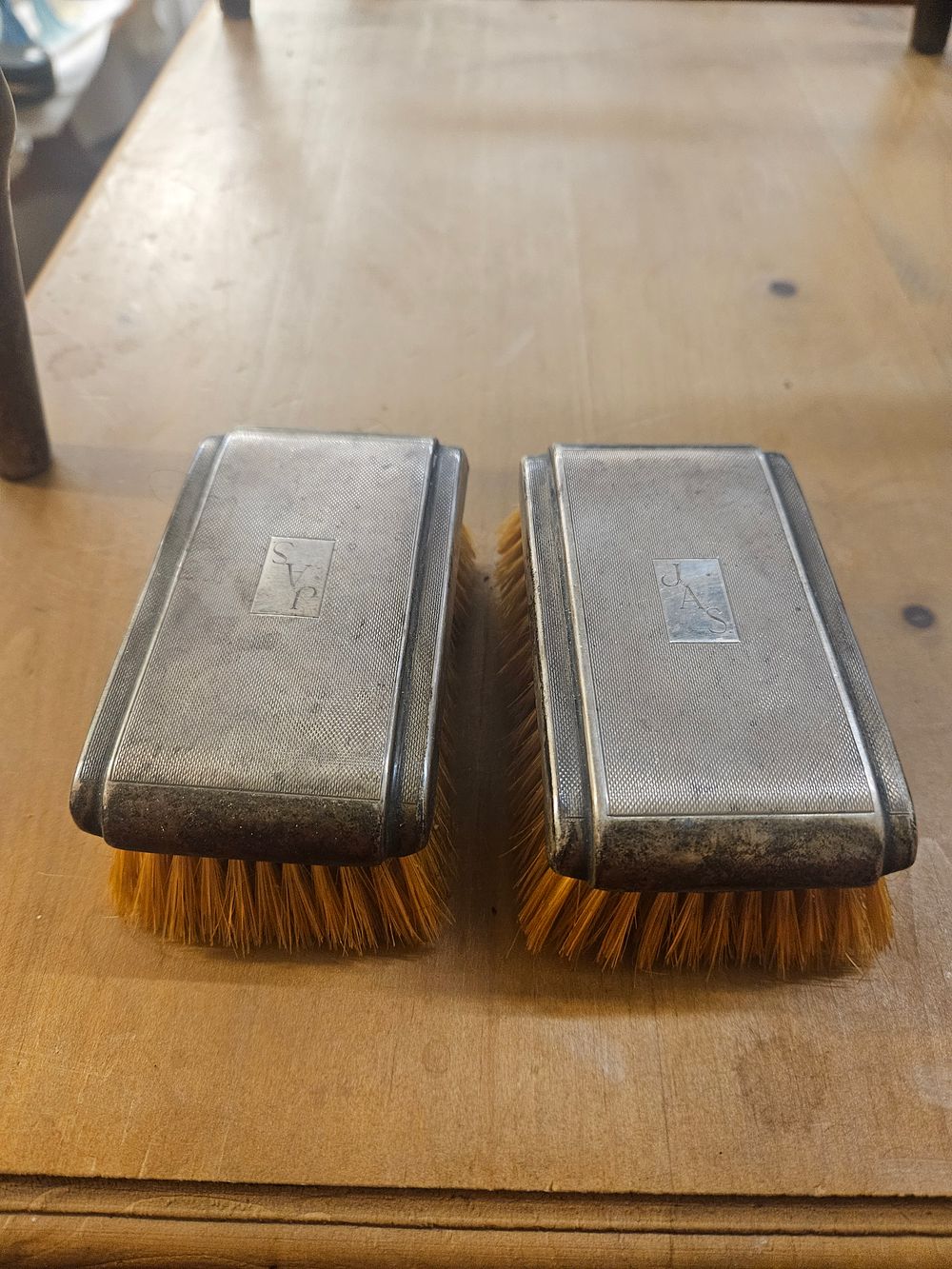 Lot 425 – Pair of silver brushes