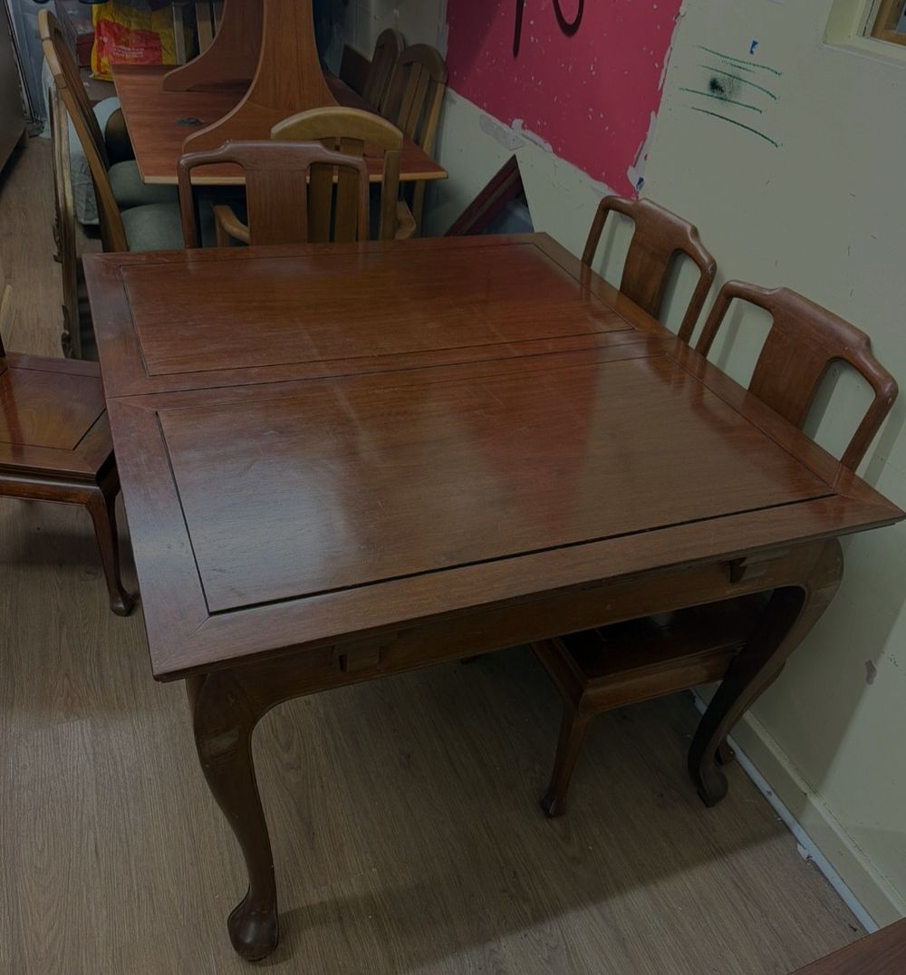 Lot 207 – A 20th-Century Chinese-Style Hardwood Extending Dining Suite