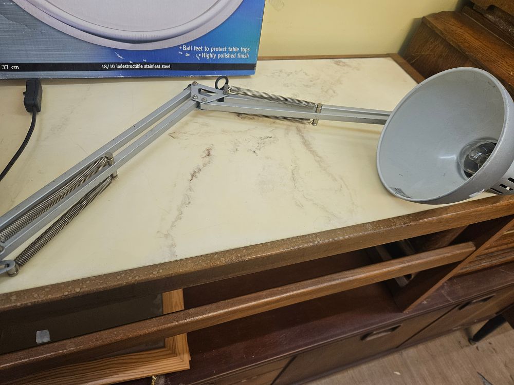 Lot 223 – A Mid-20th-Century Silver-Painted Articulated Metal Desk Lamp