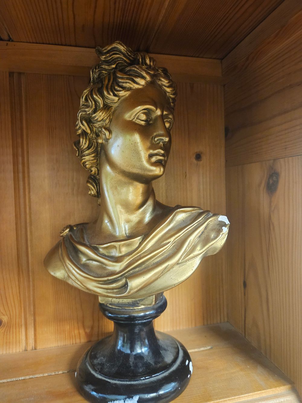 Lot 228 – Apollo – A Gilt-Patinated Plaster Bust after the Apollo Belvedere
