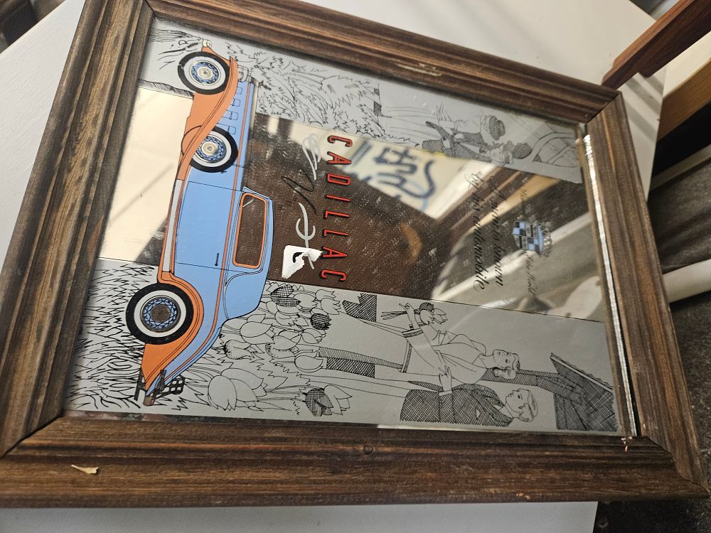 Lot 264 – Cadillac A Man is Known by his Automobile Framed Advertising Mirror
