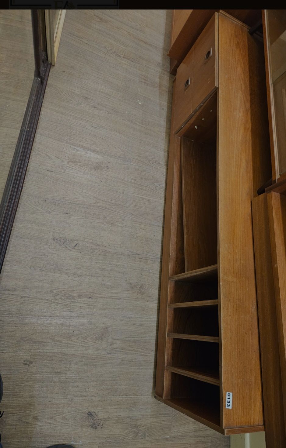 Lot 305 – A Mid-Century Teak Veneer Slimline Storage Unit