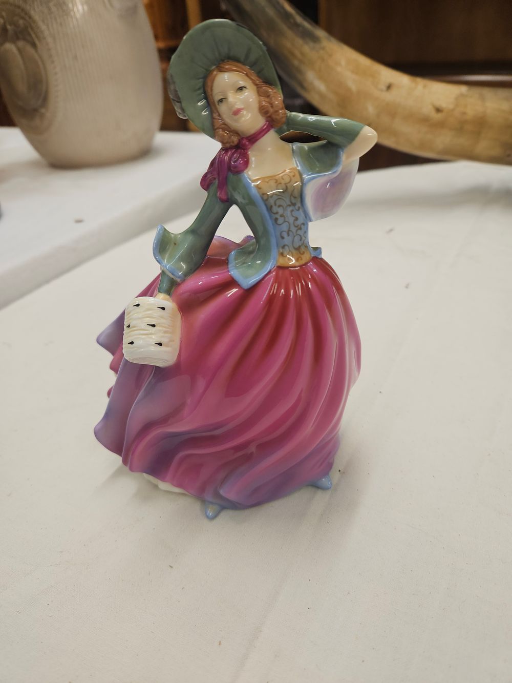Lot 147 – A Royal Doulton Pretty Ladies Bone China Figurine Autumn Breeze HN 4716