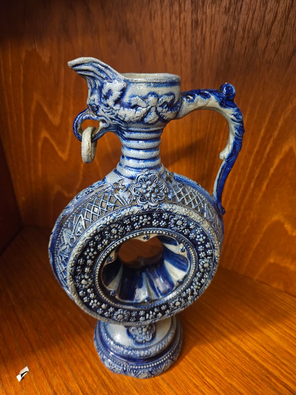 Lot 157 – A 19th Century German Westerwald Style Salt-Glazed Stoneware Ring Jug