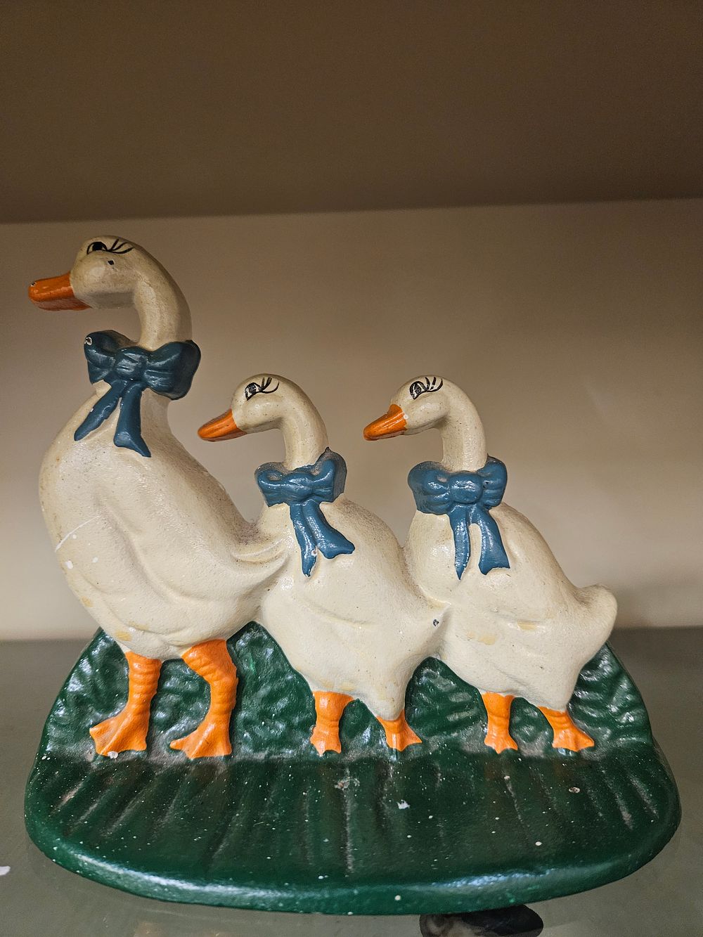 Lot 178 – A Vintage Painted Cast Iron Doorstop Modelled as a Trio of Geese
