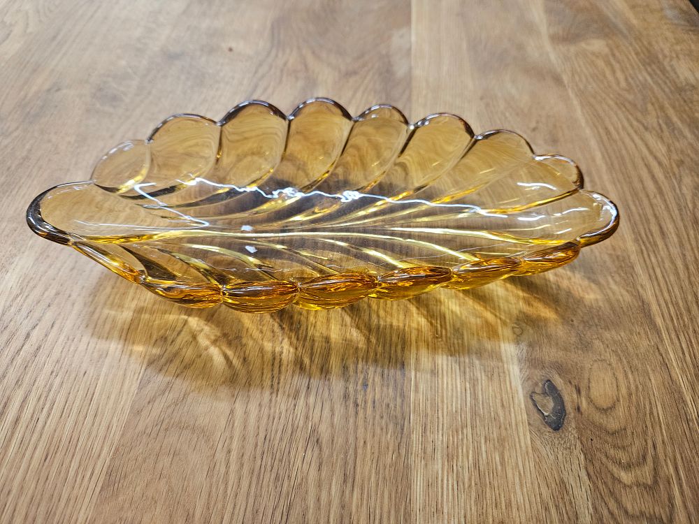 Lot 180 – A mid-20th-century amber pressed glass leaf pattern serving dish