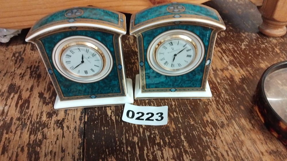 Lot 223 – A Pair of Royal Doulton Porcelain Malachite Pattern Mantel Clocks