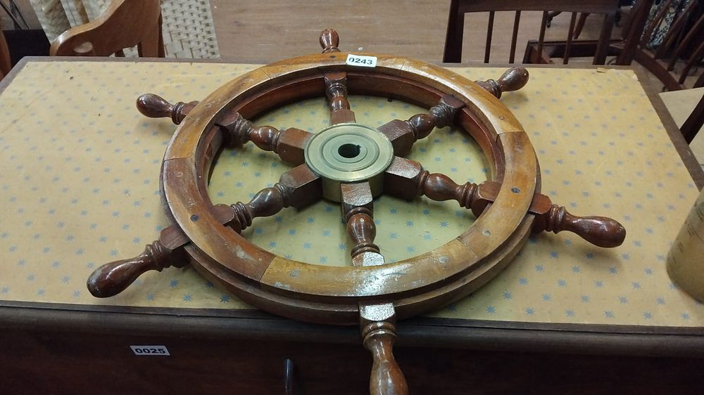 Lot 243 – Eight-Spoke Wooden Nautical Steering Wheel with Brass Hub