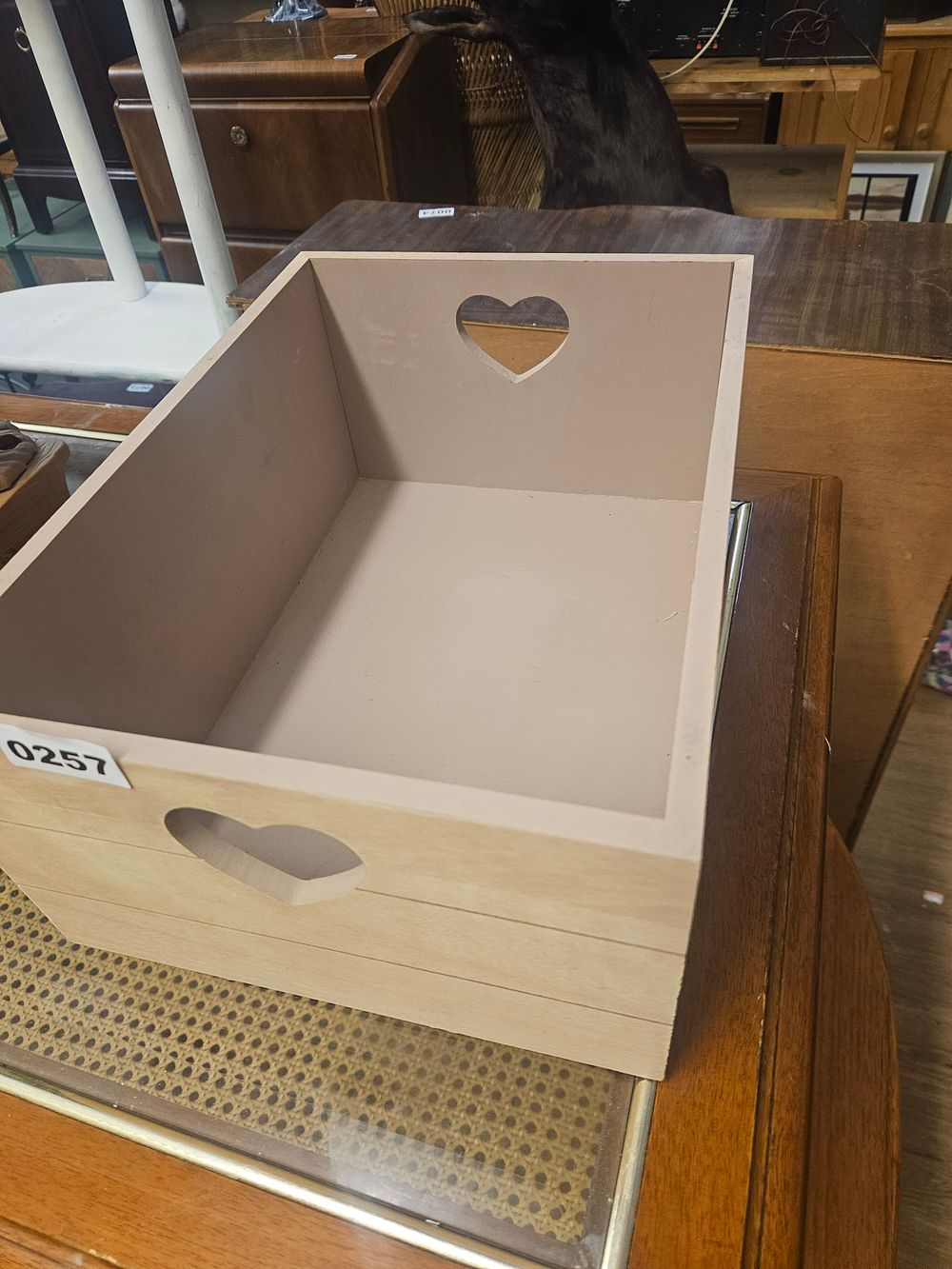 Lot 257 – A Large Painted Wooden Slat Crate with Heart-Shaped Handles