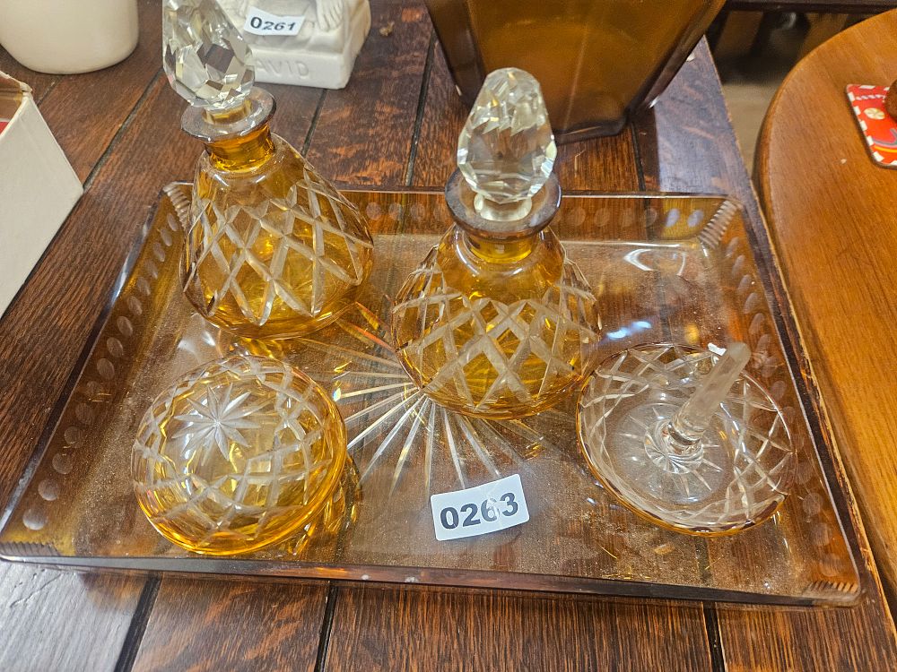 Lot 263 – A Set of Amber Cut Glass Dressing Table Wares