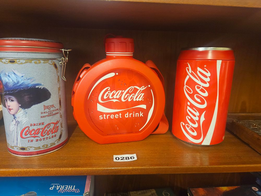 Lot 286 – A Trio of Coca-Cola Branded Collectible Containers