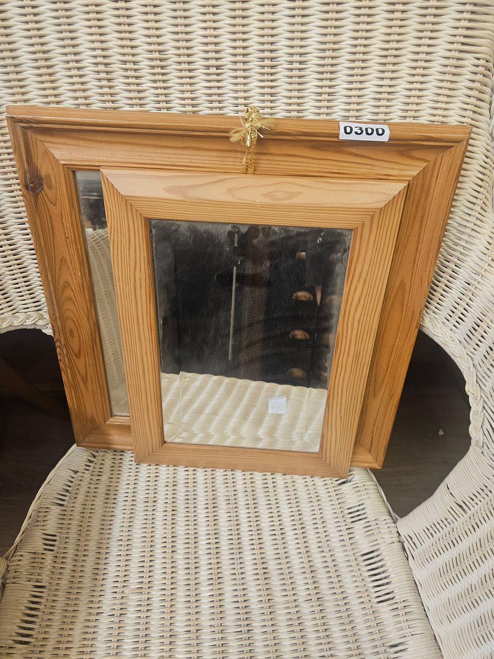 Lot 300 – A contemporary wall-mounted pine mirror cabinet