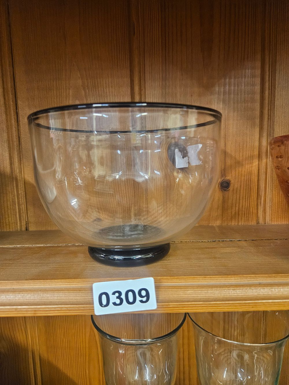 Lot 309 – A Mid-20th Century Style Clear Glass Bowl with Opaque Black Foot and Rim