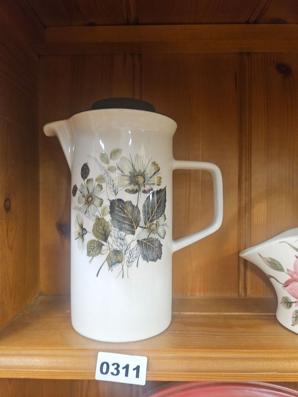 Lot 311 – Mid-20th-century earthenware coffee pot in the Wild Oats pattern