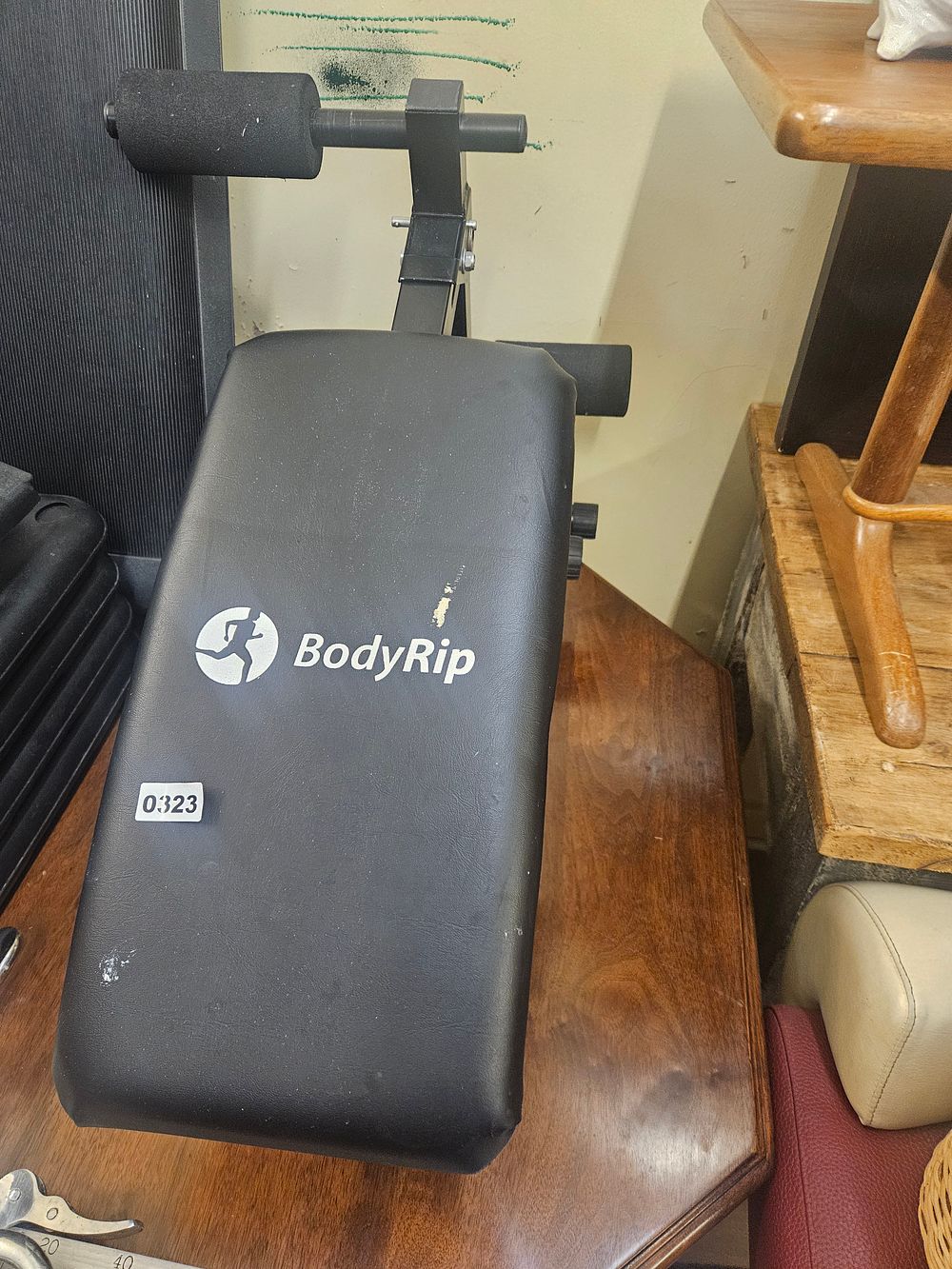 Lot 323 – A Group of BodyRip Home Gym Equipment Comprising a Weight Bench, Barbell and Weight Plates