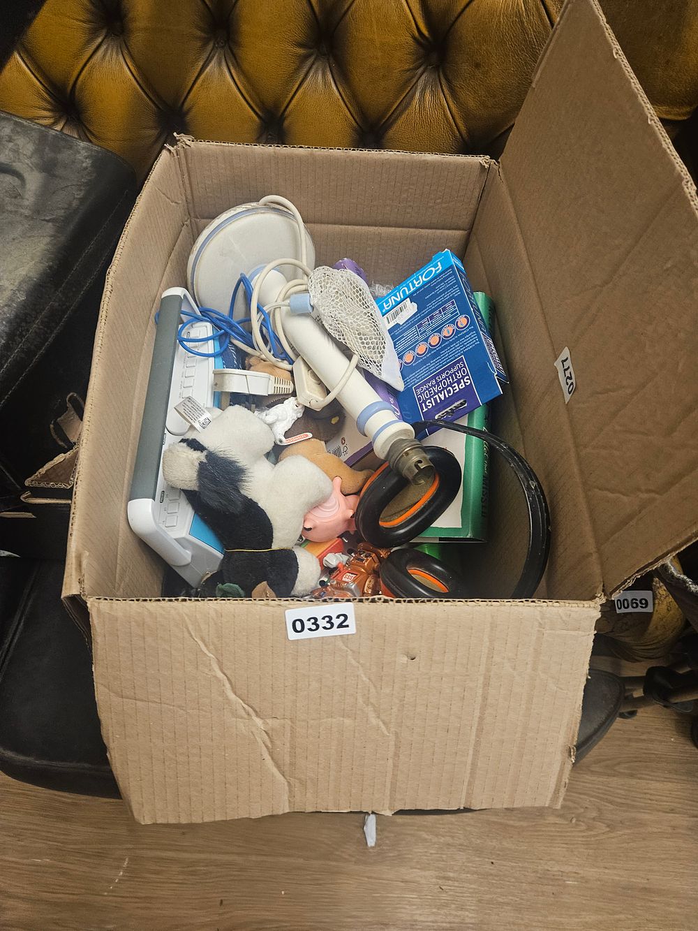Lot 332 – An Assortment of Miscellaneous Household Items, Electronics, and Personal Care Goods