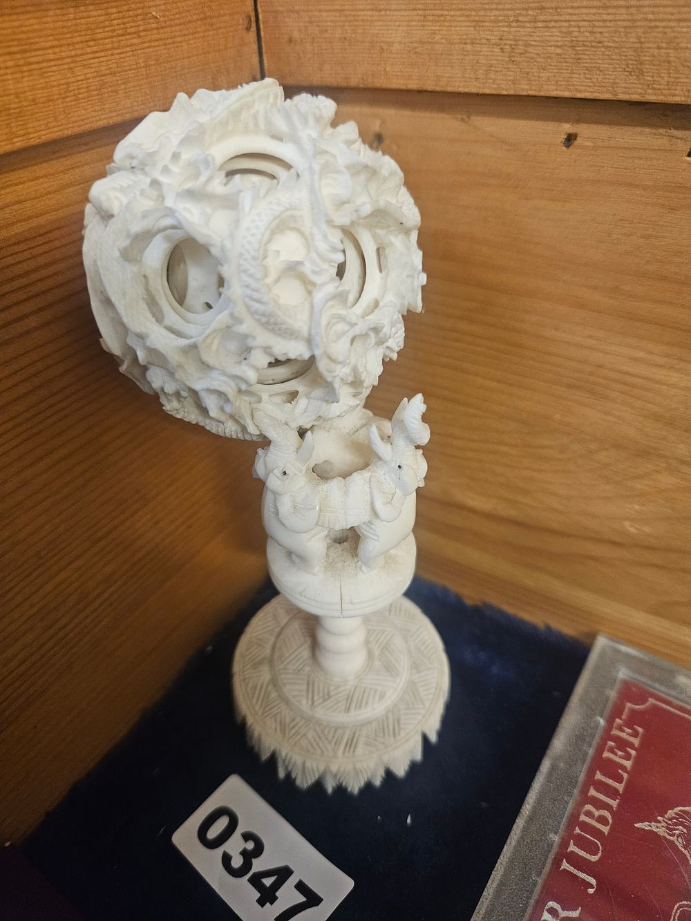Lot 347 – Chinese Carved Bone or Ivory Puzzle Ball on Elephant Stand