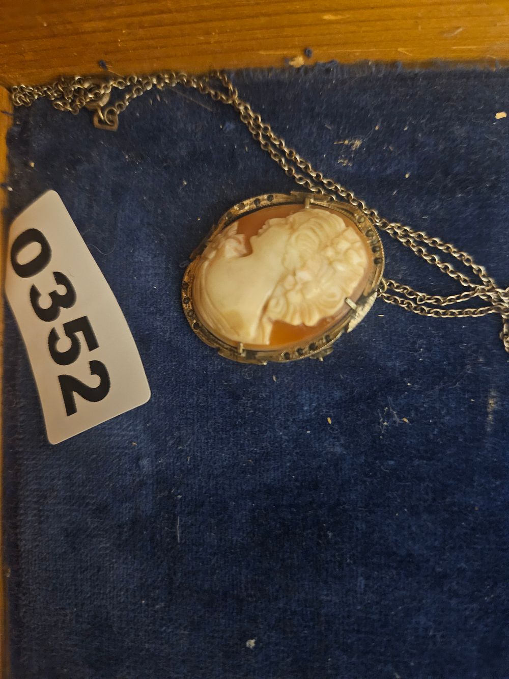 Lot 352 – A Mid-20th Century Shell Cameo Pendant and Trace Link Chain