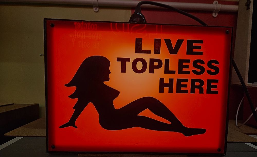 Lot 150b – Late 20th Century Illuminated Live Topless Here Novelty Sign