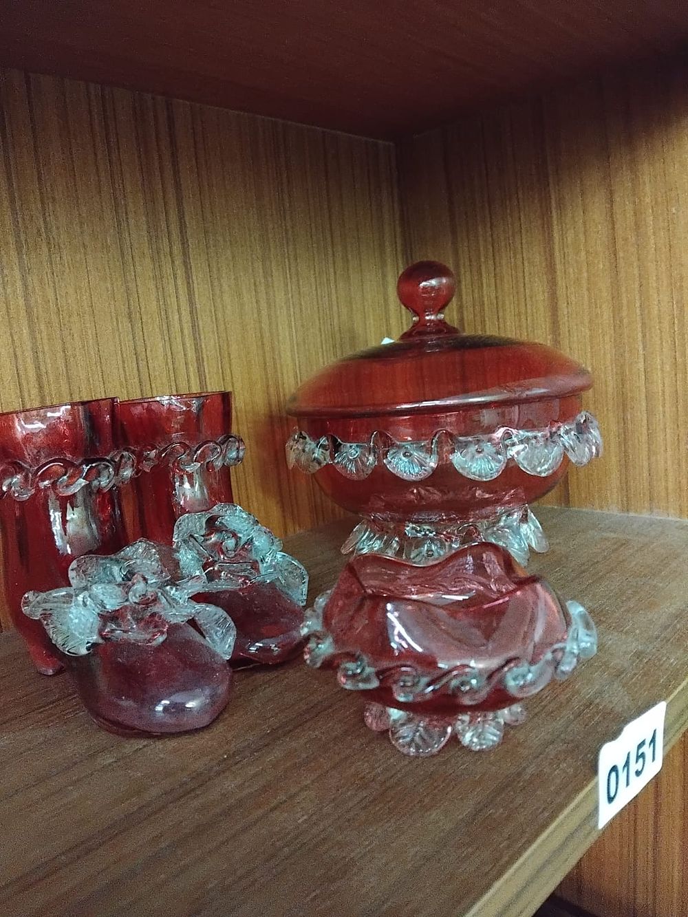 Lot 151 – A Collection of Victorian Style Cranberry Glass Decorative Items