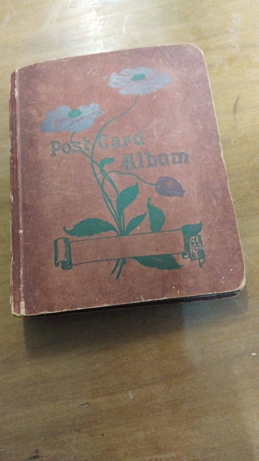 Lot 185 – Early 20th Century Hardbound Postcard Album with Poppies Motif