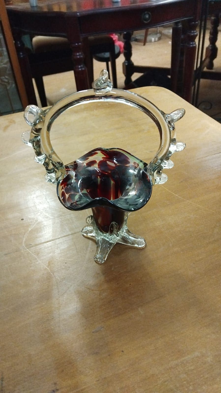 Lot 189 – A Victorian Style Spatter Glass Basket with Applied Clear Rigaree Handle and Tripod Base