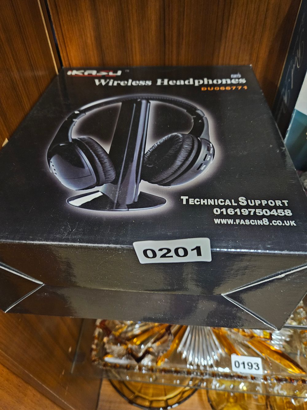 Lot 201 – Ikasu Wireless Headphones DU066771 with Transmitter Base