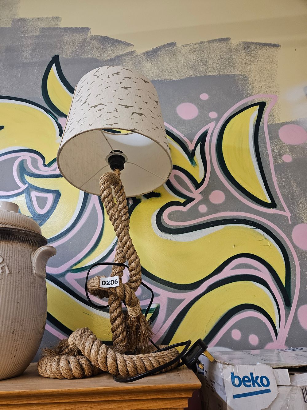 Lot 206 – A Contemporary Nautical Style Rope Table Lamp with Bird Patterned Shade