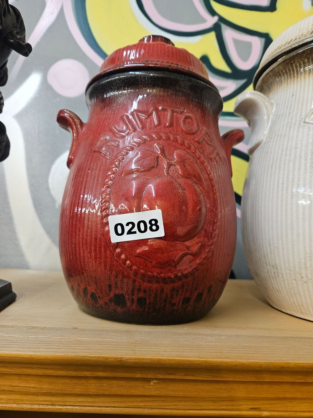 Lot 208 – A West German Fat Lava Glazed Ceramic Rumtopf Jar and Lid
