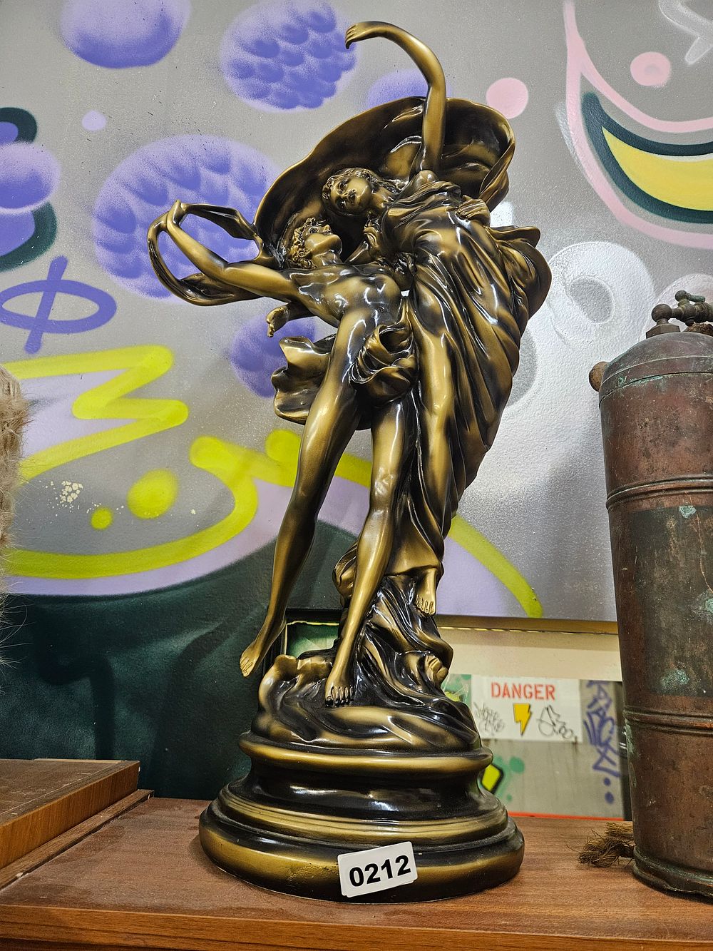 Lot 212 – A Patinated Bronze-Toned Sculpture of The Storm After Pierre-Auguste Cot