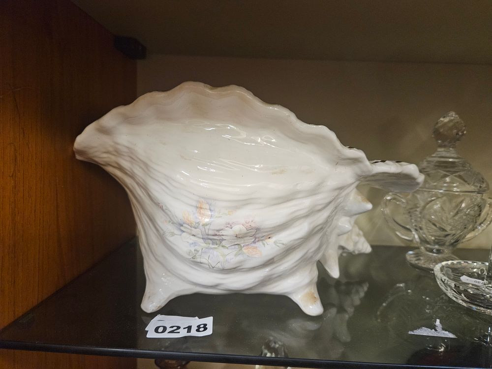 Lot 218 – Large Earthenware Conch Shell-Form Planter with Floral Decoration