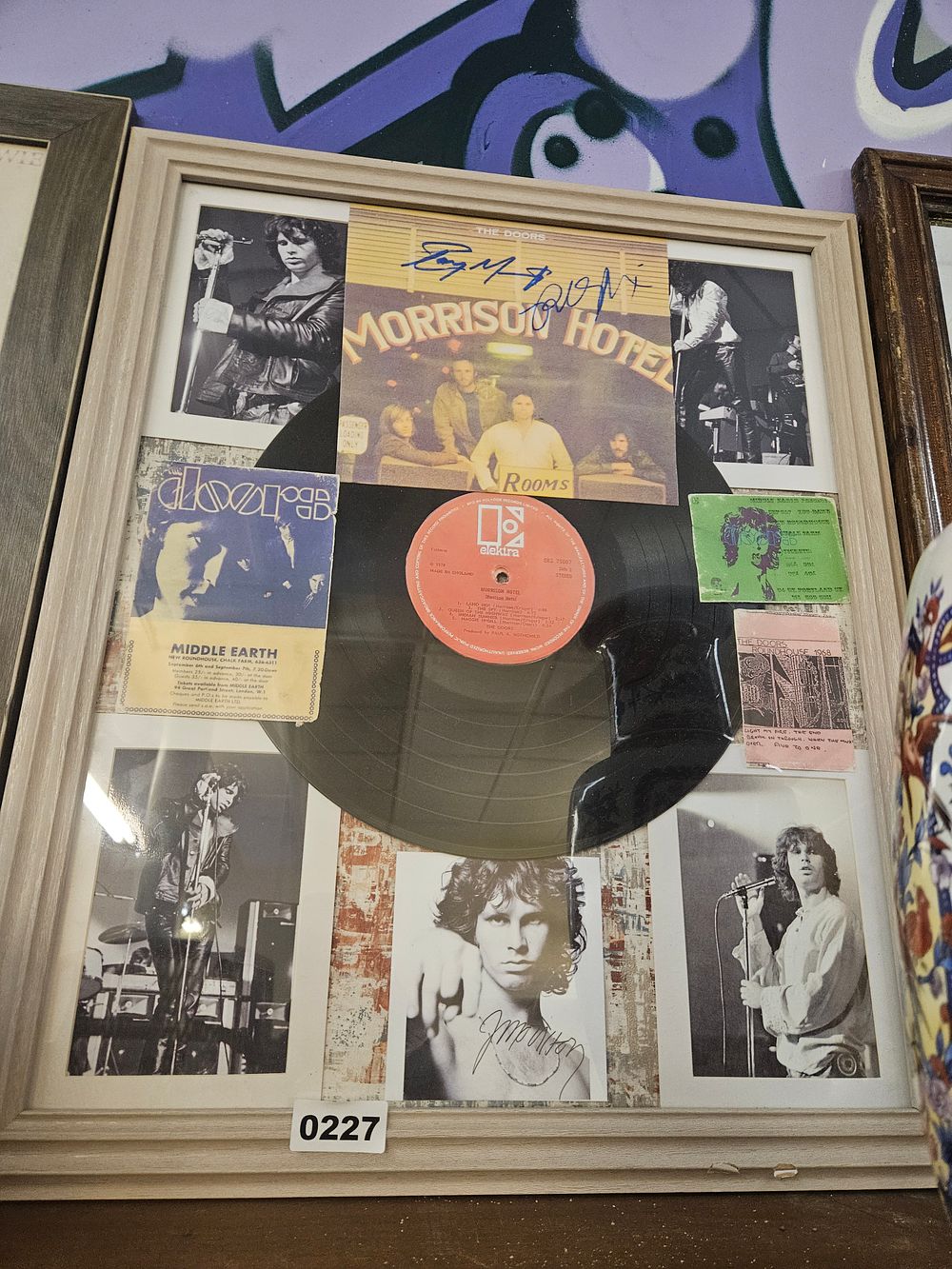 Lot 227 – Framed The Doors Memorabilia Montage Featuring Morrison Hotel Vinyl and Autographs reproduction
