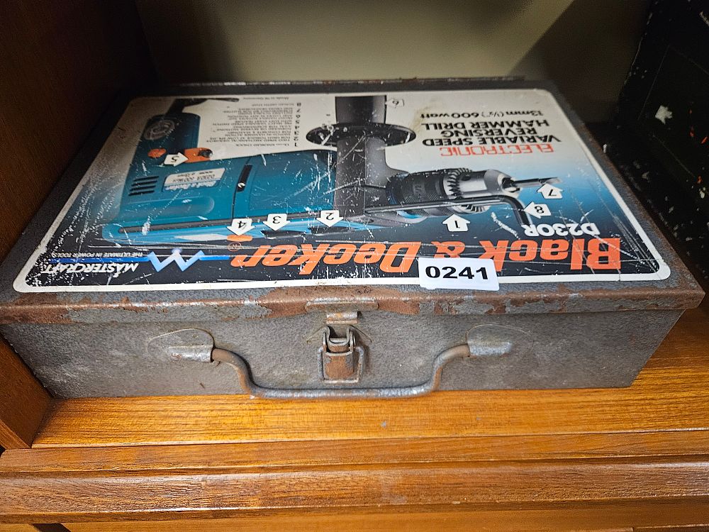 Lot 241 – A Vintage Black & Decker D230R Hammer Drill Metal Carrying Case