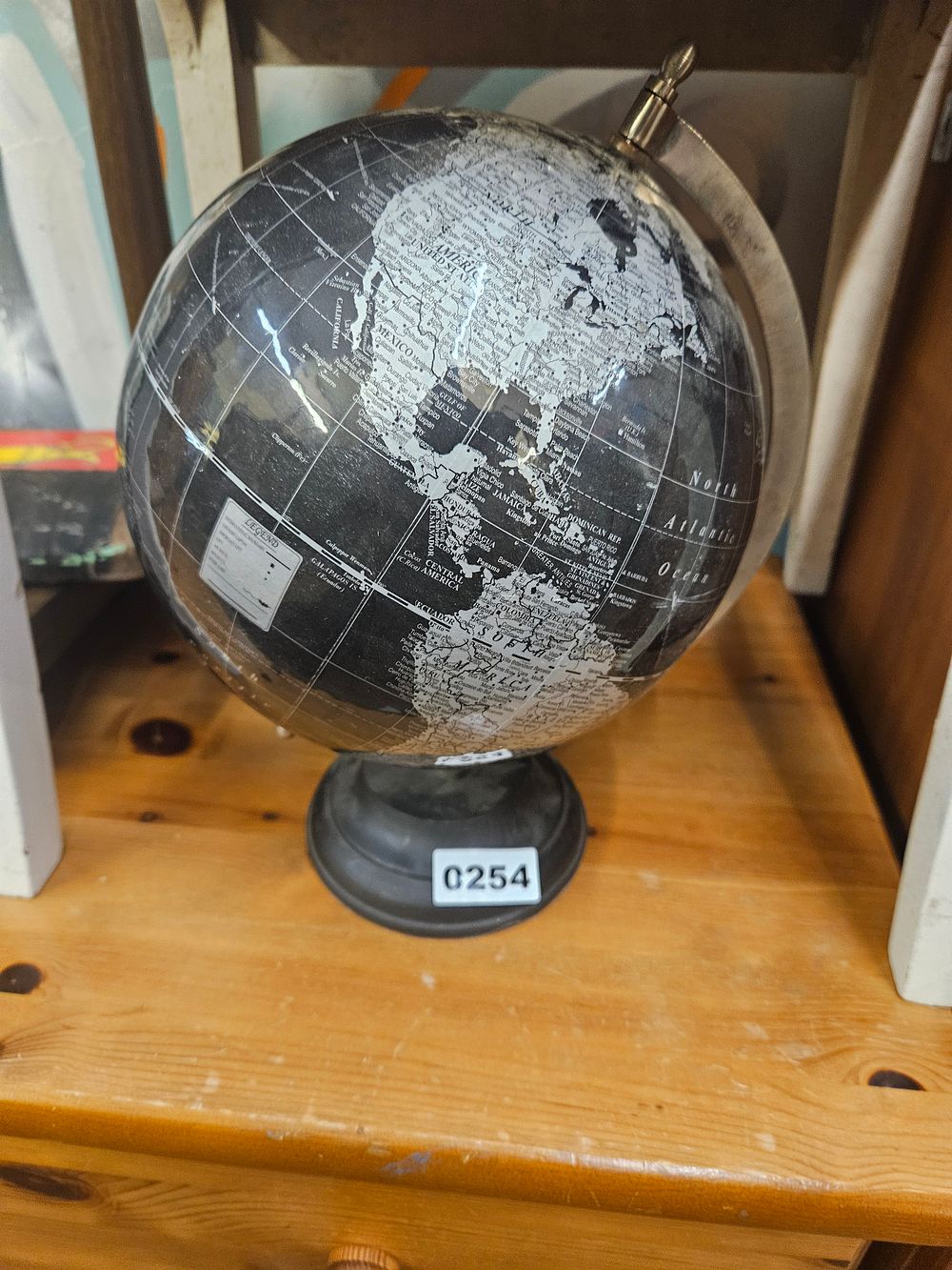 Lot 254 – A Contemporary Monochrome Decorative Desk Globe on Pedestal Base