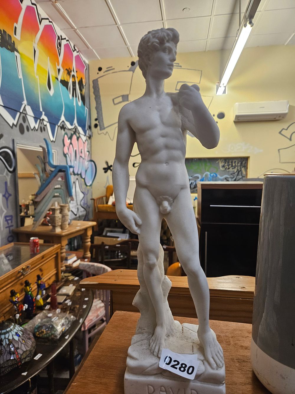 Lot 280 – A Cast White Composition Sculpture After Michelangelo’s David
