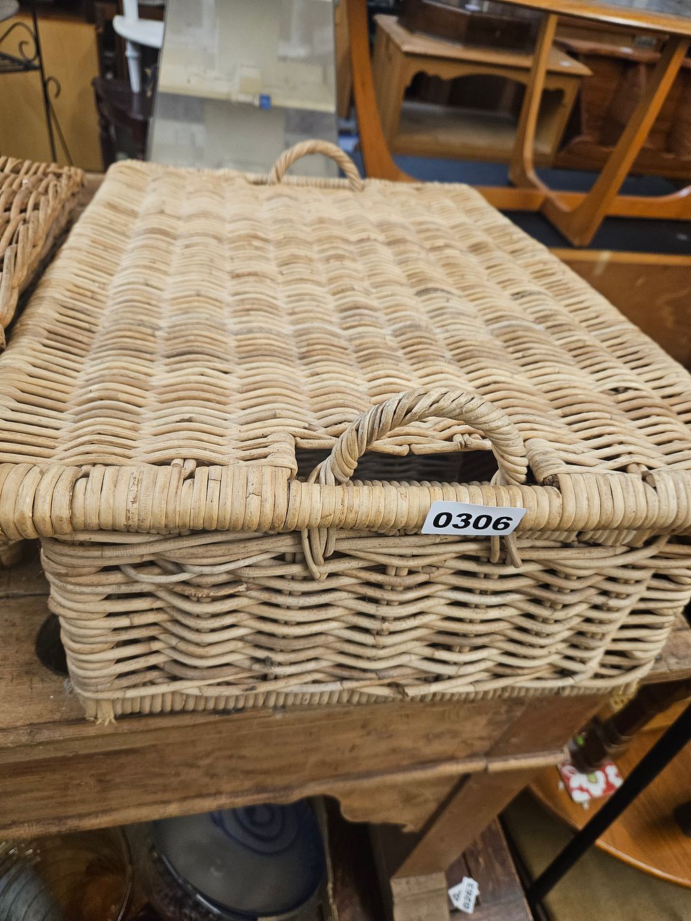 Lot 306 – A Large Rectangular Woven Wicker Storage Basket with Lid