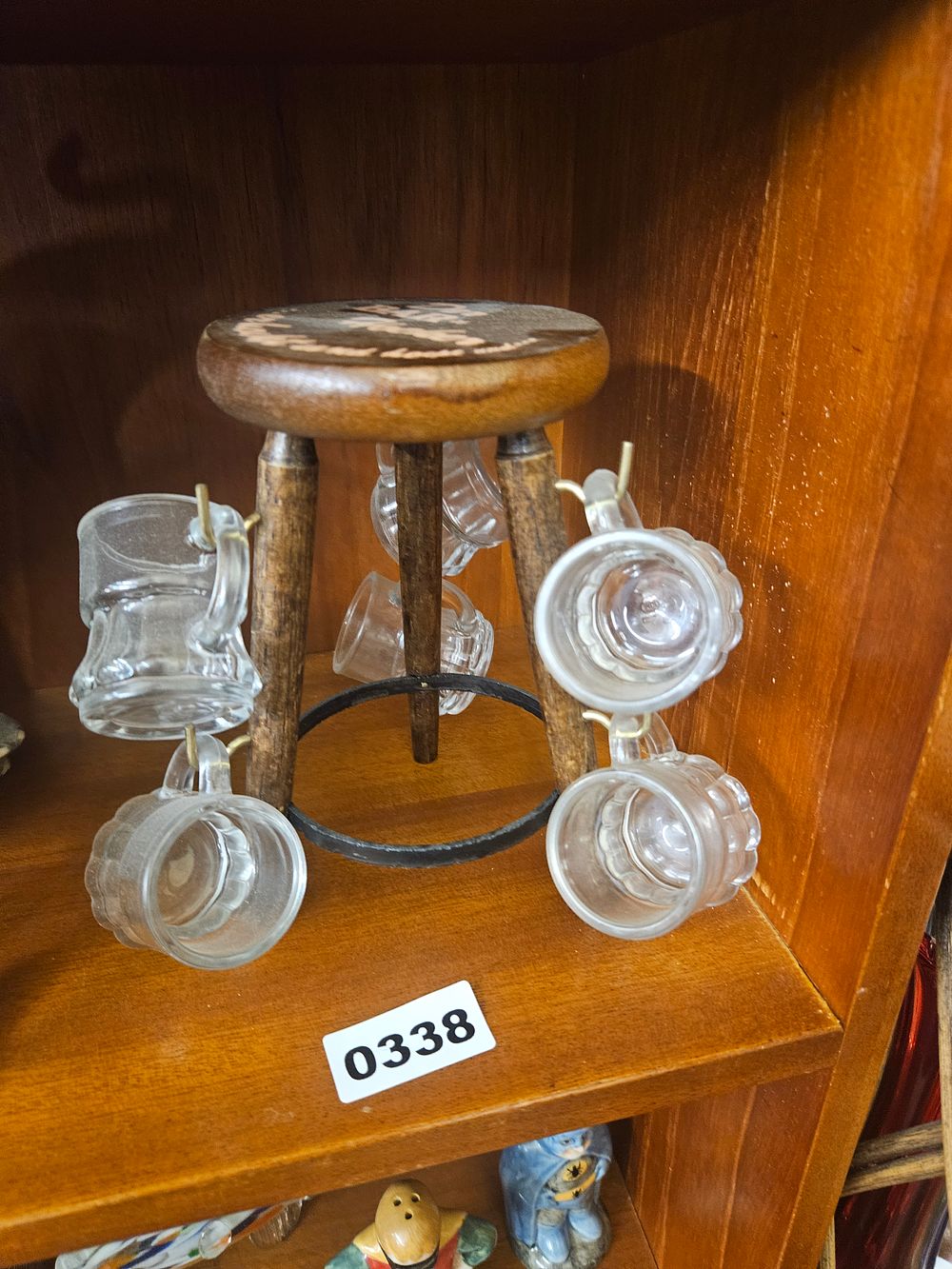 Lot 338 – A Group of Miniature Glass Tankards on a Turned Wood Stand