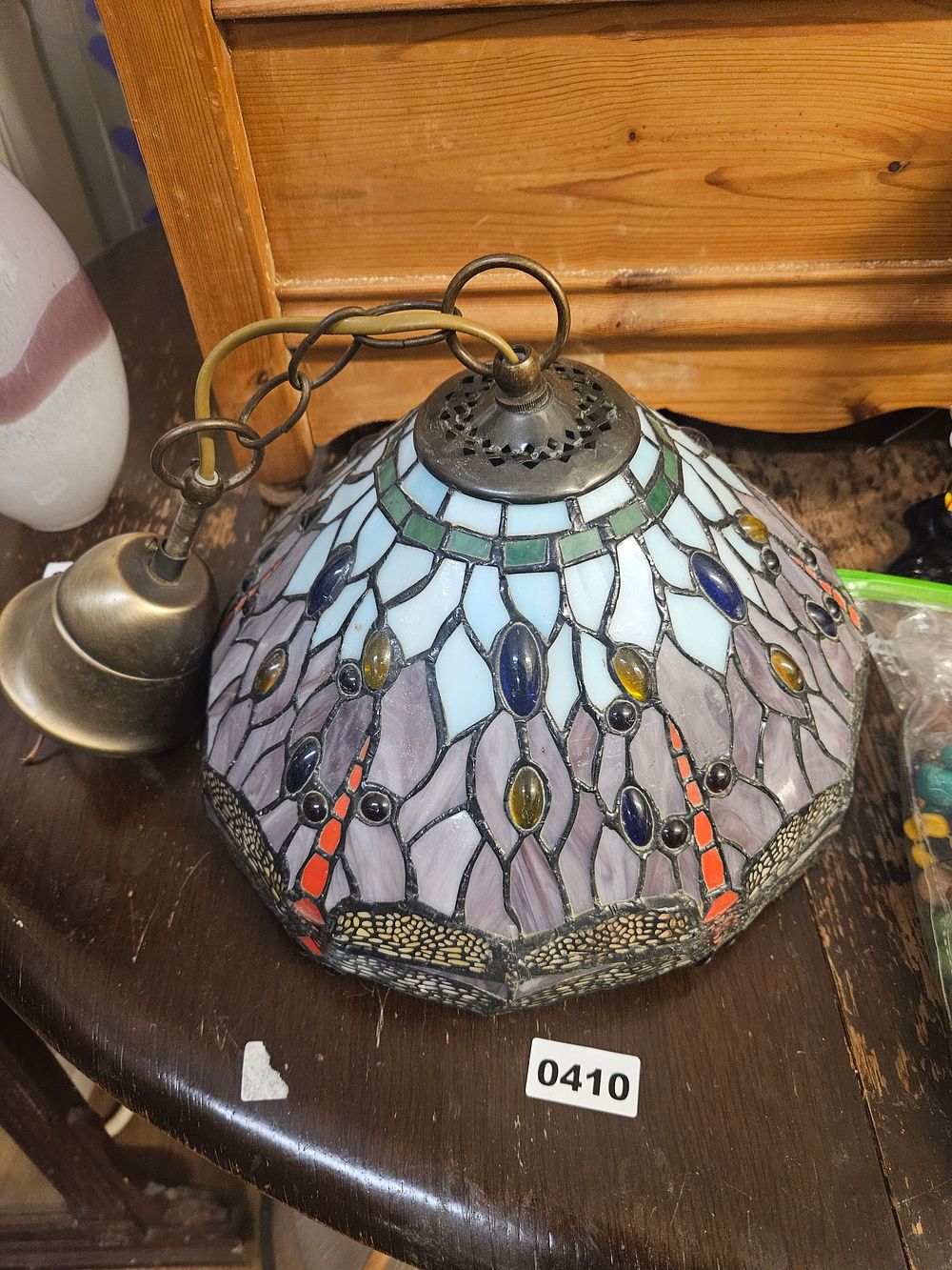 Lot 410 – A Tiffany-style leaded glass pendant lamp shade with peacock feather motif