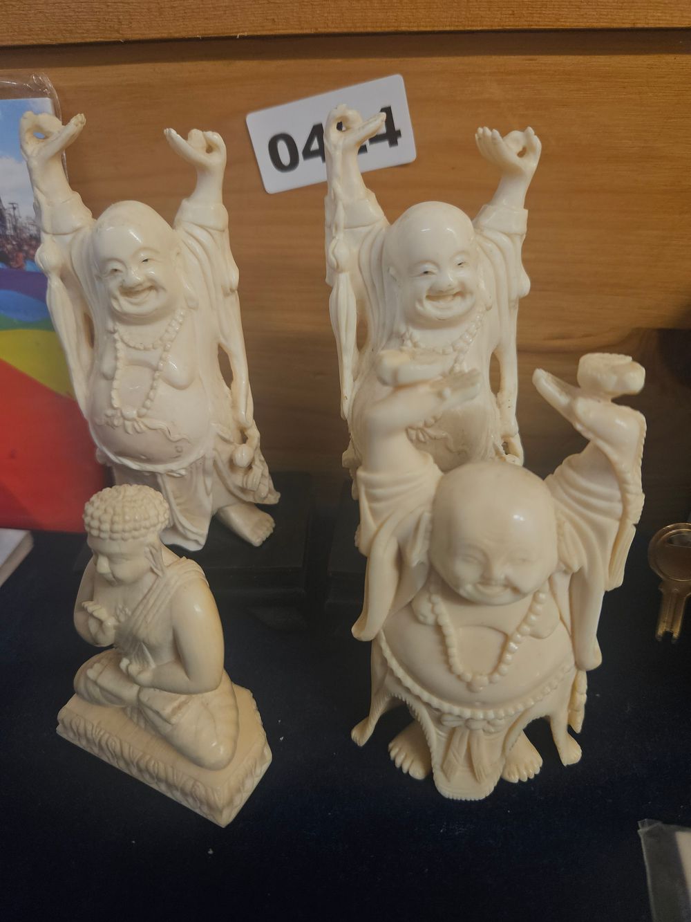 Lot 424 – A Collection of Resin Laughing Buddha Figures