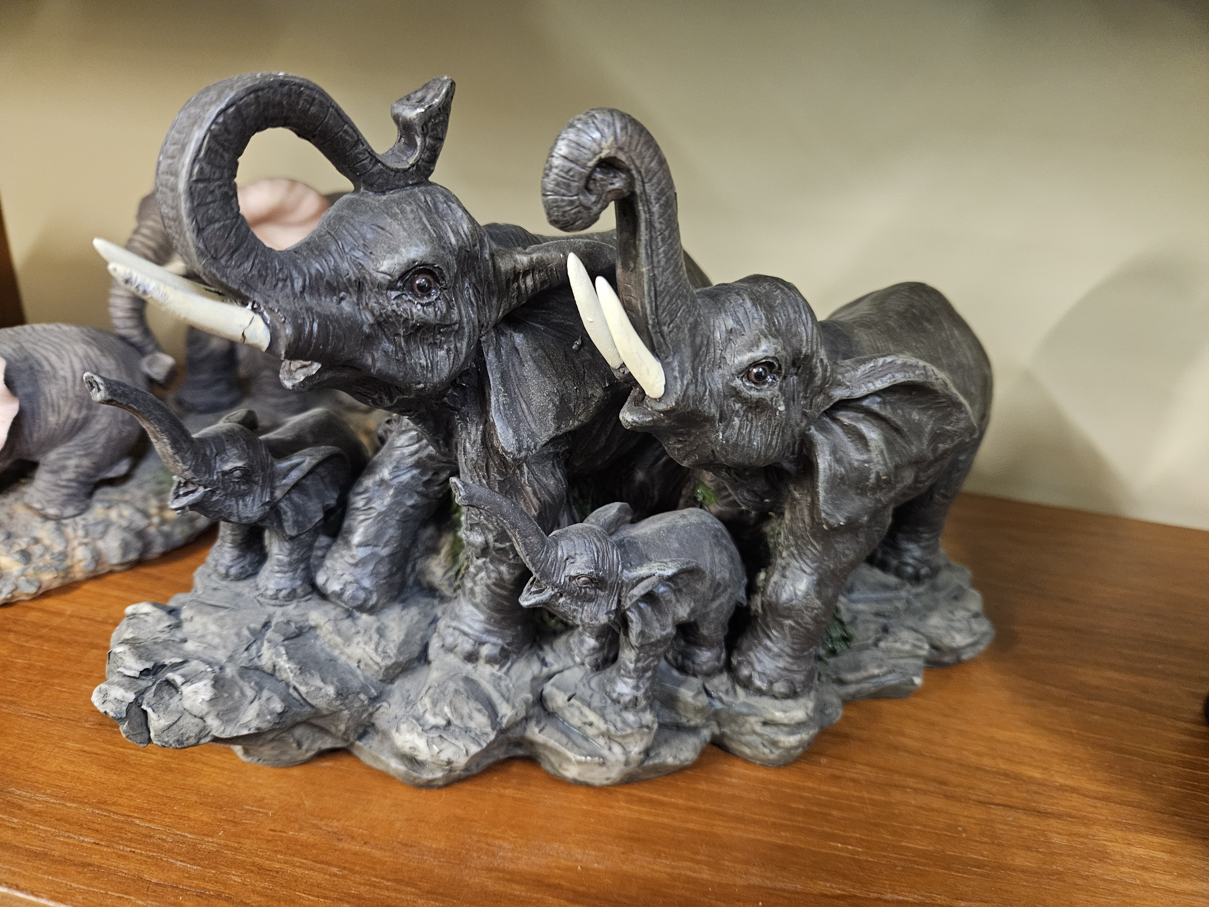A Contemporary Cold-Cast Resin Figurine of an Elephant Family