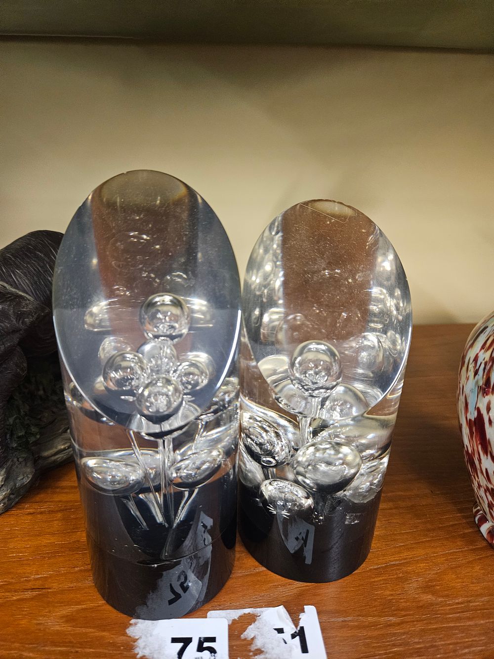 Lot 213 – A Pair of Mid-Century Style Controlled Bubble Clear Glass Paperweights