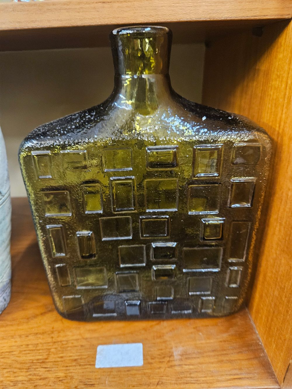 Lot 215 – An Italian Mid-Century Modern Seedy Olive Green Glass Decanter in a Brutalist Style
